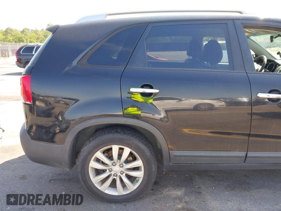 2011 Kia Sorento EX with VIN 5XYKUDA27BG053442, listed as a IAAI auction lot 42062265 with 120,996 mi miles. Bid and sale history available at carsss.com. Image 14.