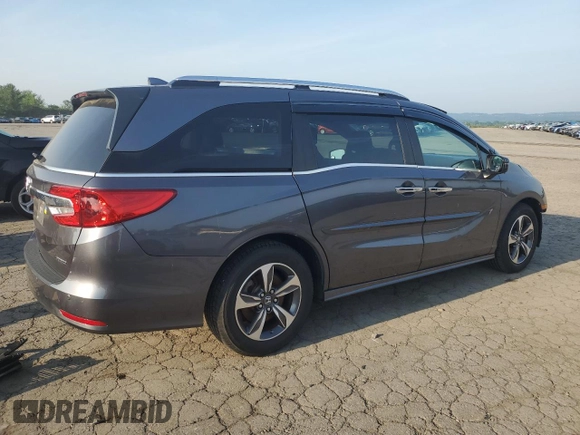 2018 Honda Odyssey Touring с VIN 5FNRL6H83JB009998, выставлен на аукционе Copart как лот 60616695 с пробегом 101 880 миль миль и Списание • Salvage title. История ставок и продаж доступна на DreamBid. Изображение 3.