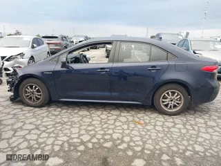 2020 Toyota Corolla Hybrid LE with VIN JTDEBRBE8LJ022596, listed as a IAAI auction lot 41772107 with 49,563 mi miles. Bid and sale history available at carsss.com. Image 14.