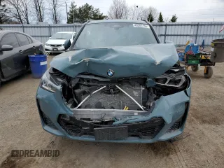 2023 BMW X1 xDrive28i with VIN WBX73EF02P5W11223, listed as a Copart auction lot 49205155 with 17,083 mi miles and Salvage Title. Bid and sale history available at DreamBid. Image 5.