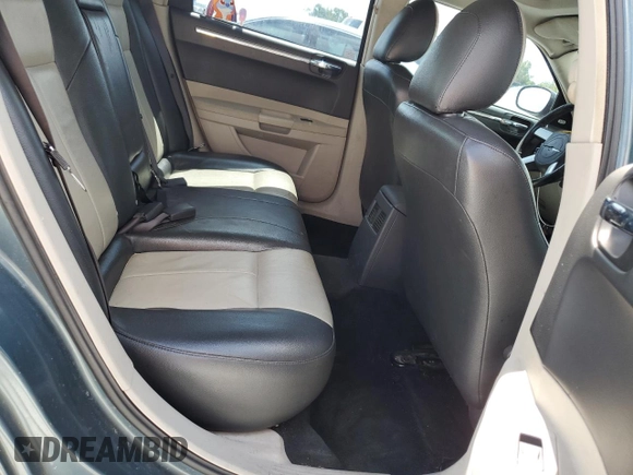 2005 Chrysler 300 Touring z VIN 2C3JA53G95H546536, wystawiony jako Copart lot #60667575 z przebiegiem 163 625 mil mil oraz Szkoda całkowita • Salvage title. Historia ofert i sprzedaży dostępna na DreamBid. Obrazek 10.