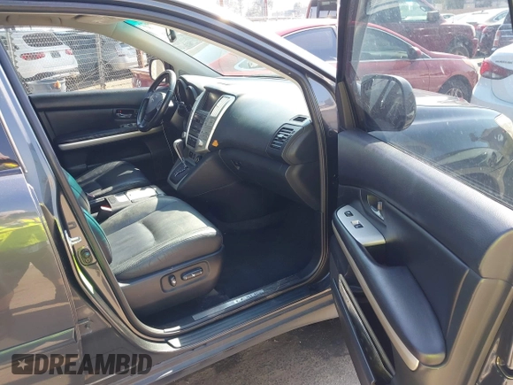 2006 Lexus RX 400h with VIN JTJHW31U560009707, listed as a IAAI auction lot 42148672 with 198,569 mi miles and . Bid and sale history available at DreamBid. Image 5.