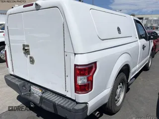 2018 Ford F-150 XL with VIN 1FTMF1CB3JKF08360, listed as a IAAI auction lot 42103764 with 131,469 mi miles and . Bid and sale history available at DreamBid. Image 1.