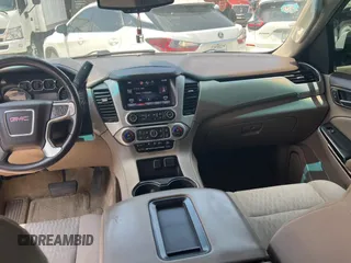 2015 GMC Yukon SLE with VIN 1GKS1AKCXFR513784, listed as a Copart auction lot 54203395 with 219,112 mi miles and Clean Title. Bid and sale history available at carsss.com. Image 9.