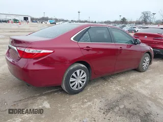 2016 Toyota Camry XLE with VIN 4T1BF1FKXGU533008, listed as a IAAI auction lot 41957727 with 184,022 mi miles. Bid and sale history available at carsss.com. Image 4.