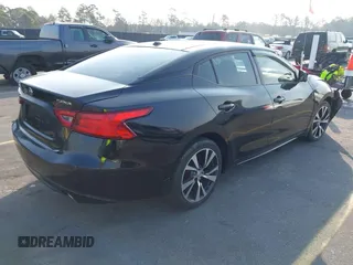 2016 Nissan Maxima SL z VIN 1N4AA6AP1GC383512, wystawiony jako IAAI lot #41490666 z przebiegiem 110 235 mil mil oraz . Historia ofert i sprzedaży dostępna na DreamBid. Obrazek 4.