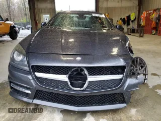 2015 Mercedes-Benz SLK 250 z VIN WDDPK4HA9FF104558, wystawiony jako Copart lot #52104545 z przebiegiem 77 054 mil mil oraz Szkody całkowita. Historia ofert i sprzedaży dostępna na DreamBid. Obrazek 5.