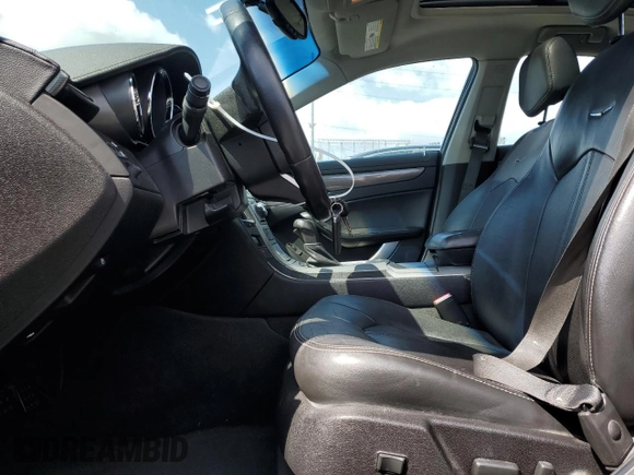 2012 Cadillac CTS Performance with VIN 1G6DK5E37C0158838, listed as a Copart auction lot 50449075 with 65,987 mi miles and Salvage Title. Bid and sale history available at DreamBid. Image 7.