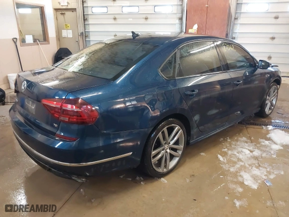 2018 Volkswagen Passat 2.0T S with VIN 1VWAA7A38JC013787, listed as a IAAI auction lot 41587362 with 127,970 mi miles. Bid and sale history available at carsss.com. Image 4.