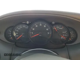 2000 Porsche 911 z VIN WP0AA2993YS621294, wystawiony jako Copart lot #47546345 z przebiegiem Nie podano mil oraz Szkoda całkowita • Salvage title. Historia ofert i sprzedaży dostępna na DreamBid. Obrazek 9.