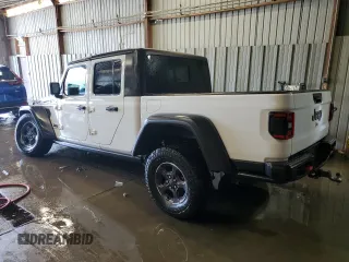 2021 Jeep Gladiator Rubicon с VIN 1C6JJTBG8ML527146, выставлен на аукционе Copart как лот 55036755 с пробегом 77 695 миль миль и Списание • Salvage title. История ставок и продаж доступна на DreamBid. Изображение 2.