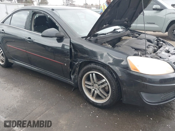 2009 Pontiac G6 1SB with VIN 1G2ZJ57B594263412, listed as a IAAI auction lot 41844953 with 234,057 mi miles and . Bid and sale history available at DreamBid. Image 6.