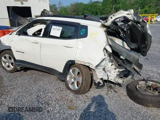 2018 Jeep Compass Latitude with VIN 3C4NJDBB4JT270975, listed as a IAAI auction lot 42477582 with 98,629 mi miles and . Bid and sale history available at DreamBid. Image 3.