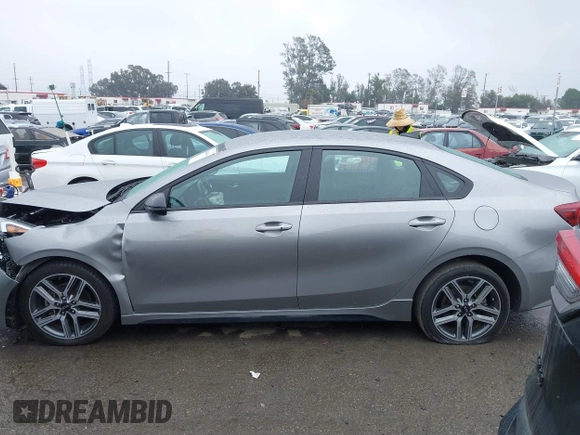 2023 Kia Forte GT-Line z VIN 3KPF54AD8PE602683, wystawiony jako IAAI lot #41444418 z przebiegiem 52 229 mil mil oraz . Historia ofert i sprzedaży dostępna na DreamBid. Obrazek 14.