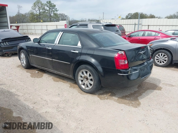 2010 Chrysler 300 Touring with VIN 2C3CA5CV0AH329717, listed as a IAAI auction lot 41785694 with 257,072 mi miles. Bid and sale history available at carsss.com. Image 3.