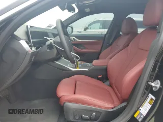 2024 BMW i4 eDrive35 with VIN WBY43AW02RFT03098, listed as a Copart auction lot 57317884 with 203 mi miles and Salvage Title. Bid and sale history available at carsss.com. Image 7.