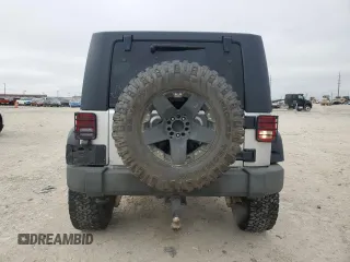 2009 Jeep Wrangler Unlimited Rubicon with VIN 1J8GA69169L731787, listed as a Copart auction lot 44604125 with 180,861 mi miles and Salvage title. Bid and sale history available at DreamBid. Image 6.