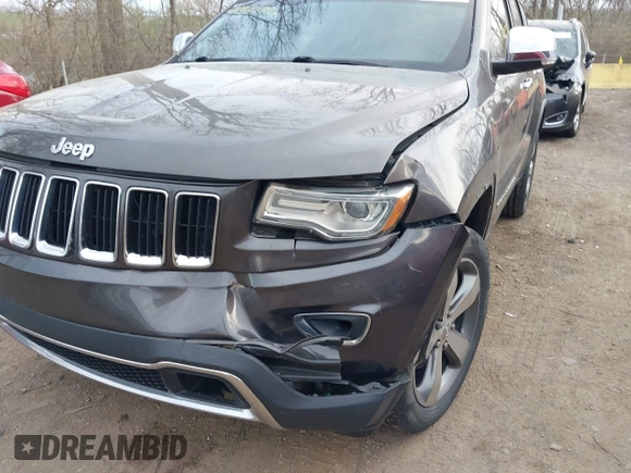 2014 Jeep Grand Cherokee Limited with VIN 1C4RJFBG3EC534827, listed as a IAAI auction lot 41907916 with 138,811 mi miles and . Bid and sale history available at DreamBid. Image 6.