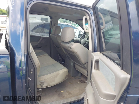 2007 Nissan Titan SE z VIN 1N6BA07B77N214250, wystawiony jako IAAI lot #42514141 z przebiegiem 184 576 mil mil oraz . Historia ofert i sprzedaży dostępna na DreamBid. Obrazek 8.