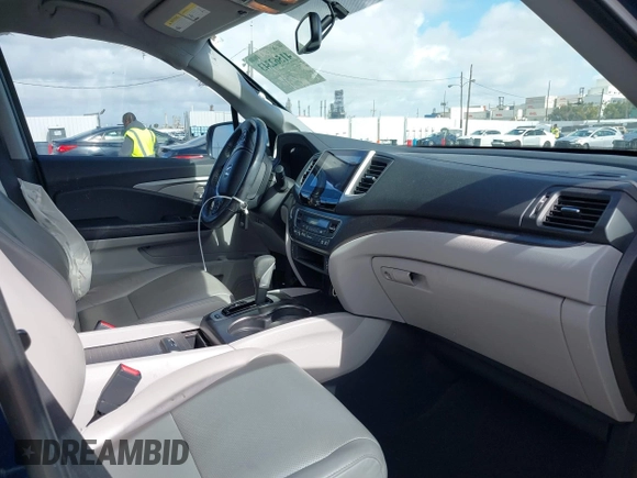 2017 Honda Ridgeline RTL-T with VIN 5FPYK2F68HB001759, listed as a IAAI auction lot 41562343 with 59,633 mi miles and . Bid and sale history available at DreamBid. Image 5.