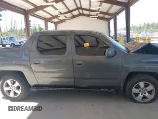 2007 Honda Ridgeline RTL with VIN 2HJYK16537H529904, listed as a IAAI auction lot 42626859 with 294,953 mi miles and . Bid and sale history available at DreamBid. Image 13.
