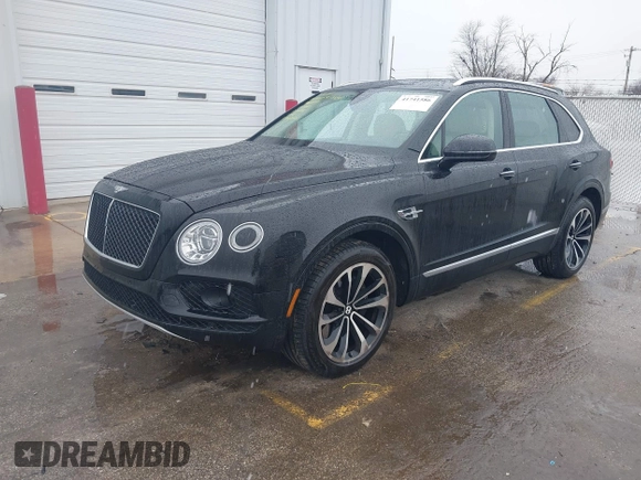 2019 Bentley Bentayga V8 z VIN SJAAM2ZVXKC025218, wystawiony jako IAAI lot #41741586 z przebiegiem 52 457 mil mil oraz . Historia ofert i sprzedaży dostępna na DreamBid. Obrazek 17.