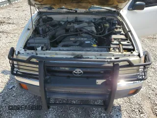 1999 Toyota Tacoma PreRunner with VIN 4TASN92NXXZ551335, listed as a Copart auction lot 62199645 with 198,754 mi miles and Salvage title. Bid and sale history available at DreamBid. Image 11.