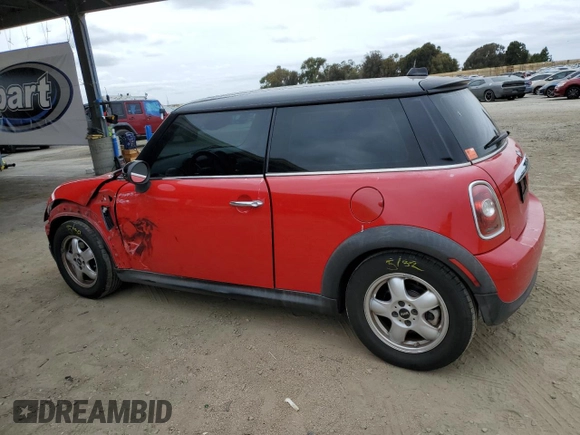 2009 MINI Hardtop with VIN WMWMF33519TW77558, listed as a Copart auction lot 54556785 with 97,749 mi miles and Salvage Title. Bid and sale history available at DreamBid. Image 2.