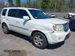 2011 Honda Pilot Touring with VIN 5FNYF4H98BB087713, listed as a IAAI auction lot 42132764 with 250,507 mi miles. Bid and sale history available at carsss.com. Image 1.