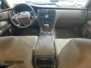 1999 Infiniti Q45 z VIN JNKBY31A6XM600579, wystawiony jako Copart lot #57683075 z przebiegiem 215 415 mil mil oraz Szkoda całkowita • Salvage title. Historia ofert i sprzedaży dostępna na DreamBid. Obrazek 8.