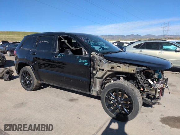 2017 Jeep Grand Cherokee Laredo with VIN 1C4RJFAG7HC701728, listed as a Copart auction lot 52784065 with 32,522 mi miles and Salvage Title. Bid and sale history available at carsss.com. Image 4.