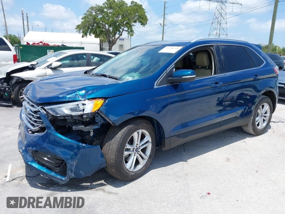 2020 Ford Edge SEL z VIN 2FMPK3J94LBB45306, wystawiony jako IAAI lot #39398218 z przebiegiem 59 807 mil mil oraz . Historia ofert i sprzedaży dostępna na DreamBid. Obrazek 2.