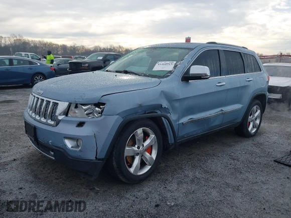 2013 Jeep Grand Cherokee Overland with VIN 1C4RJFCT2DC572978, listed as a IAAI auction lot 41468915 with 223,528 mi miles. Bid and sale history available at carsss.com. Image 2.
