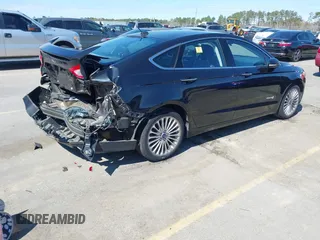 2013 Ford Fusion Titanium Hybrid with VIN 3FA6P0RU2DR288773, listed as a IAAI auction lot 41803708 with 85,868 mi miles and . Bid and sale history available at DreamBid. Image 4.