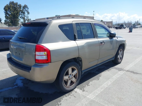 2007 Jeep Compass Sport with VIN 1J8FF47W87D241293, listed as a IAAI auction lot 41963241 with 251,852 mi miles. Bid and sale history available at carsss.com. Image 4.