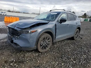 2024 Mazda CX-5 S Carbon Edition z VIN JM3KFBCM4R0392759, wystawiony jako Copart lot #45571245 z przebiegiem 7594 mil mil oraz Szkody całkowita. Historia ofert i sprzedaży dostępna na DreamBid. Obrazek 1.