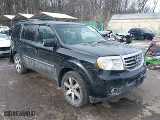 2012 Honda Pilot Touring with VIN 5FNYF4H98CB066989, listed as a IAAI auction lot 41358409 with 173,169 mi miles. Bid and sale history available at carsss.com. Image 1.