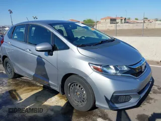 2020 Honda Fit LX z VIN 3HGGK5H48LM700879, wystawiony jako IAAI lot #42290266 z przebiegiem 90 963 mil mil oraz . Historia ofert i sprzedaży dostępna na DreamBid. Obrazek 1.