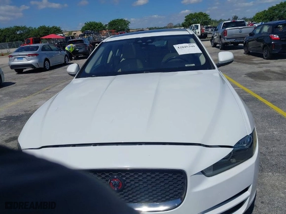 2018 Jaguar XE 25t Premium with VIN SAJAD4FX1JCP24088, listed as a IAAI auction lot 42045360 with 80,156 mi miles. Bid and sale history available at carsss.com. Image 12.