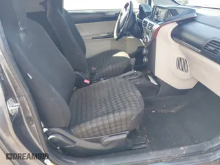 2012 Scion iQ with VIN JTNJJXB04CJ020060, listed as a IAAI auction lot 41660774 with 187,025 mi miles. Bid and sale history available at carsss.com. Image 5.