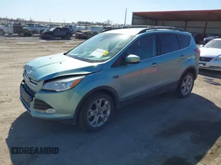 2013 Ford Escape SEL with VIN 1FMCU9HX2DUA71931, listed as a IAAI auction lot 41757318 with 149,344 mi miles. Bid and sale history available at carsss.com. Image 2.