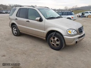 2002 Mercedes-Benz M-Class with VIN 4JGAB54E82A308902, listed as a IAAI auction lot 41779482 with 99,933 mi miles. Bid and sale history available at carsss.com. Image 1.