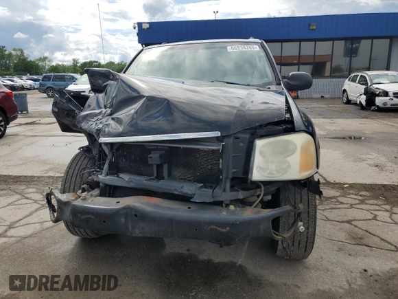 2003 GMC Envoy SLE z VIN 1GKDT13S432160651, wystawiony jako Copart lot #56938205 z przebiegiem 197 593 mil mil oraz Szkoda całkowita • Salvage title. Historia ofert i sprzedaży dostępna na DreamBid. Obrazek 5.