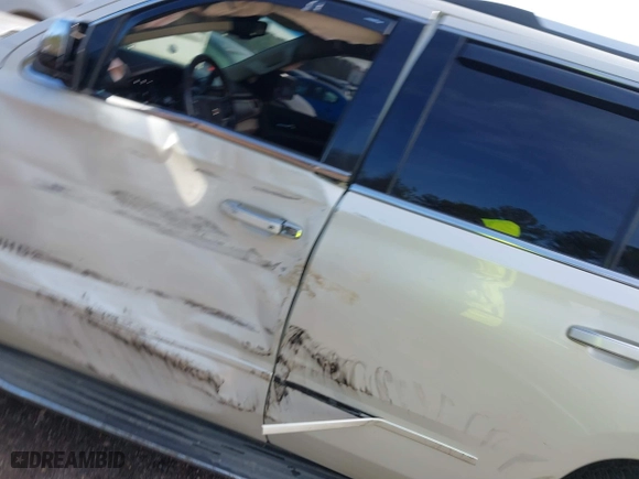 2015 Chevrolet Tahoe LTZ with VIN 1GNSCCKC2FR140524, listed as a IAAI auction lot 41592878 with 284,785 mi miles. Bid and sale history available at carsss.com. Image 14.