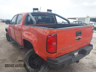 2019 Chevrolet Colorado 4WD ZR2 z VIN 1GCGTEEN9K1333740, wystawiony jako IAAI lot #41565621 z przebiegiem 71 484 mil mil oraz . Historia ofert i sprzedaży dostępna na DreamBid. Obrazek 3.
