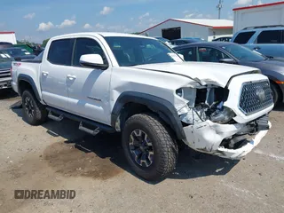 2018 Toyota Tacoma SR with VIN 3TMCZ5AN3JM136406, listed as a IAAI auction lot 42621651 with 89,344 mi miles and . Bid and sale history available at DreamBid. Image 1.