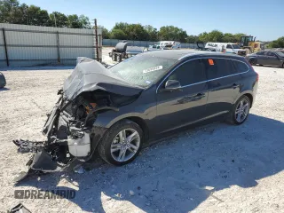 2015 Volvo V60 T5 Drive-E Premier with VIN YV140MEK7F1251940, listed as a Copart auction lot 73695834 with 143,663 mi miles and Salvage Title. Bid and sale history available at carsss.com. Image 1.