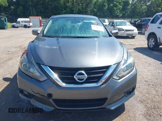 2017 Nissan Altima SV with VIN 1N4AL3AP5HC493702, listed as a IAAI auction lot 42661383 with 195,280 mi miles and . Bid and sale history available at DreamBid. Image 12.