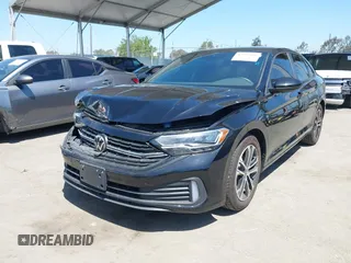 2023 Volkswagen Jetta Sport with VIN 3VWBM7BU1PM041957, listed as a IAAI auction lot 42293989 with 31,737 mi miles and . Bid and sale history available at DreamBid. Image 2.