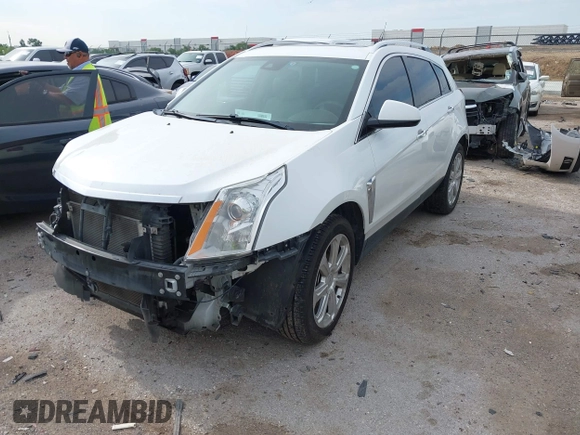 2013 Cadillac SRX Premium Collection with VIN 3GYFNEE36DS508381, listed as a IAAI auction lot 42164119 with 85,810 mi miles and . Bid and sale history available at DreamBid. Image 2.